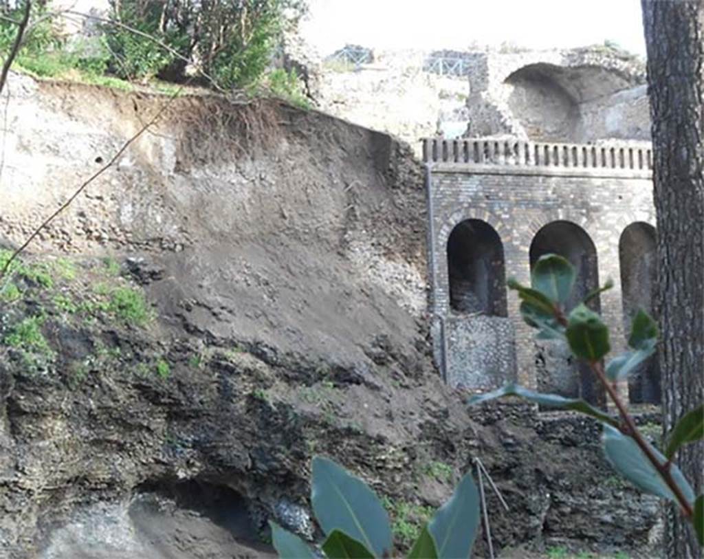 VIII.2.30 Pompeii. February 2015. Collapse of part of garden wall built on top of the lava ridge.