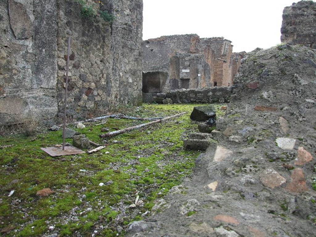 VIII.3.1 Pompeii. December 2006. Podium behind south wall.