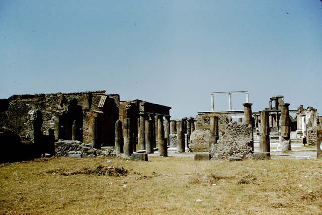 VIII.3.1 Pompeii. 1961. Looking west towards entrances at VIII.3.32, on left, and VIII.3.33 on east side of the Forum. Photo by Stanley A. Jashemski.
Source: The Wilhelmina and Stanley A. Jashemski archive in the University of Maryland Library, Special Collections (See collection page) and made available under the Creative Commons Attribution-Non Commercial License v.4. See Licence and use details.
J61f0797
