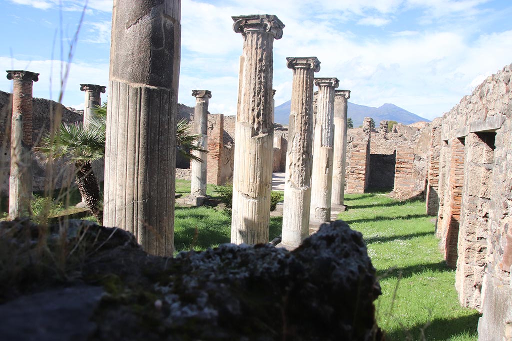 VIII.3.8 Pompeii. October 2024. Looking north along east portico, photo taken from VIII.3.13. Photo courtesy of Klaus Heese.