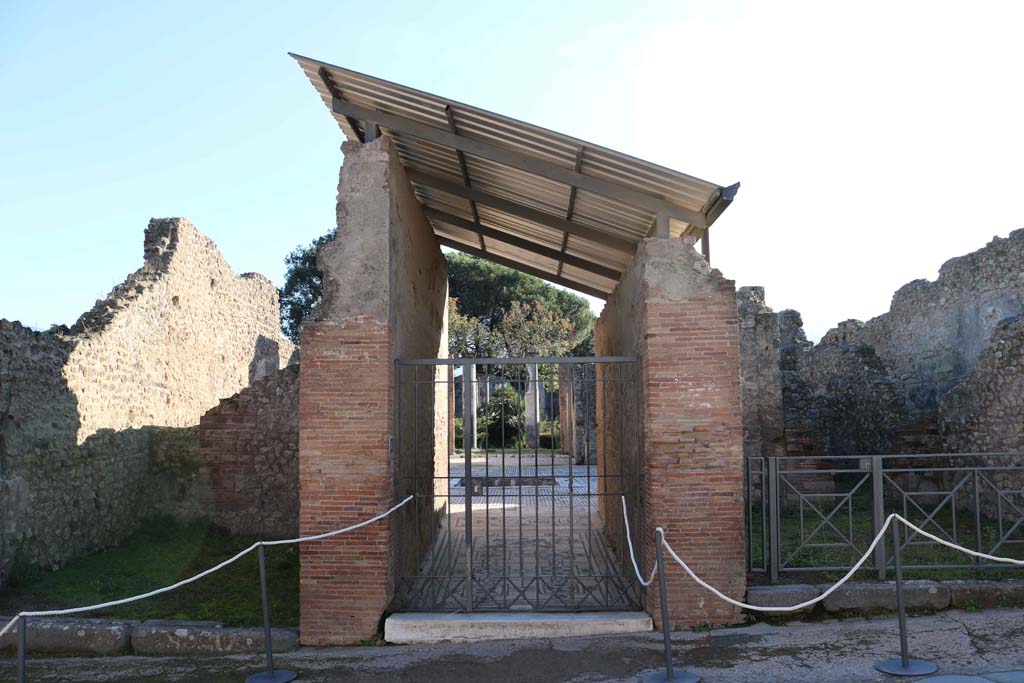 VIII.3.8, Pompeii., December 2018. 
Looking towards entrance doorway on south side of Via dell’Abbondanza. Photo courtesy of Aude Durand.

