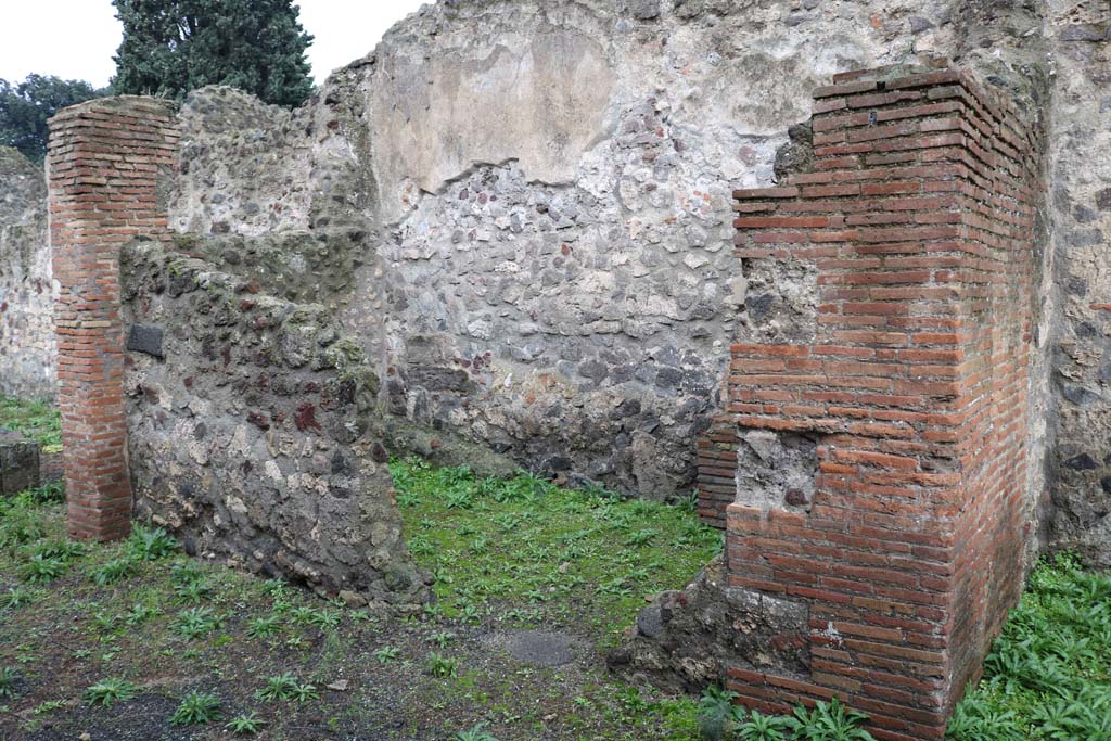 VIII.4.12 Pompeii. December 2018. 
Looking south-west towards room (kitchen?) on west side, before the peristyle, on left. Photo courtesy of Aude Durand.

