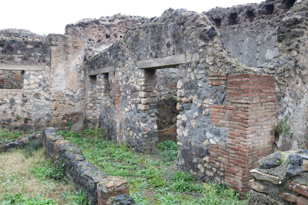 VIII.4.12, Pompeii. December 2018. Looking north to doorways to rooms on east side of peristyle. Photo courtesy of Aude Durand