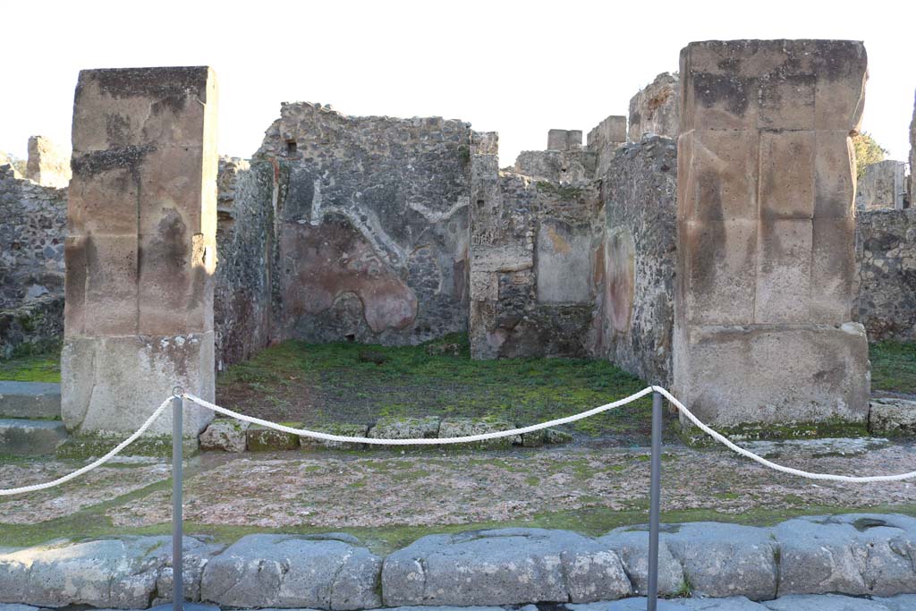 VIII.5.4, Pompeii. December 2018. Looking south to entrance doorway on Via dellAbbondanza. Photo courtesy of Aude Durand.