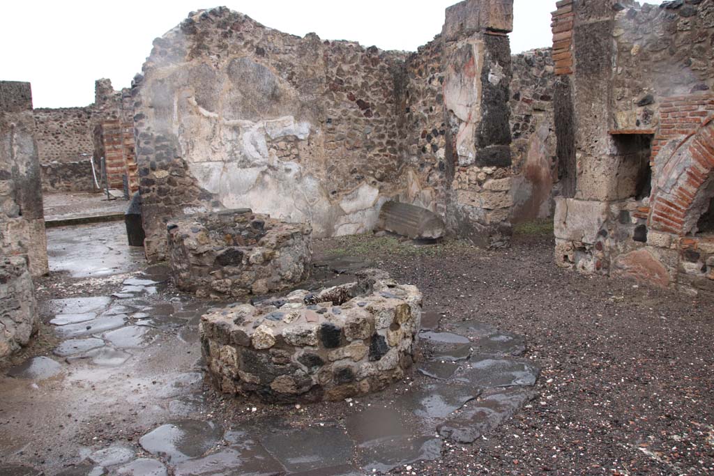 VIII.6.11 Pompeii. October 2020. 
Looking north towards doorway to room k and peristyle area, on left, and doorway to room e in north-east corner of bakery room. 
Photo courtesy of Klaus Heese.

