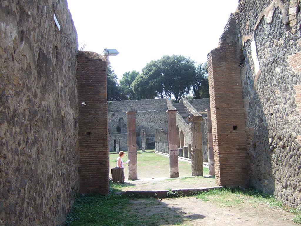 VIII.7.16 Pompeii. September 2005.  Gladiators Barracks looking north to the Large Theatre.

 
