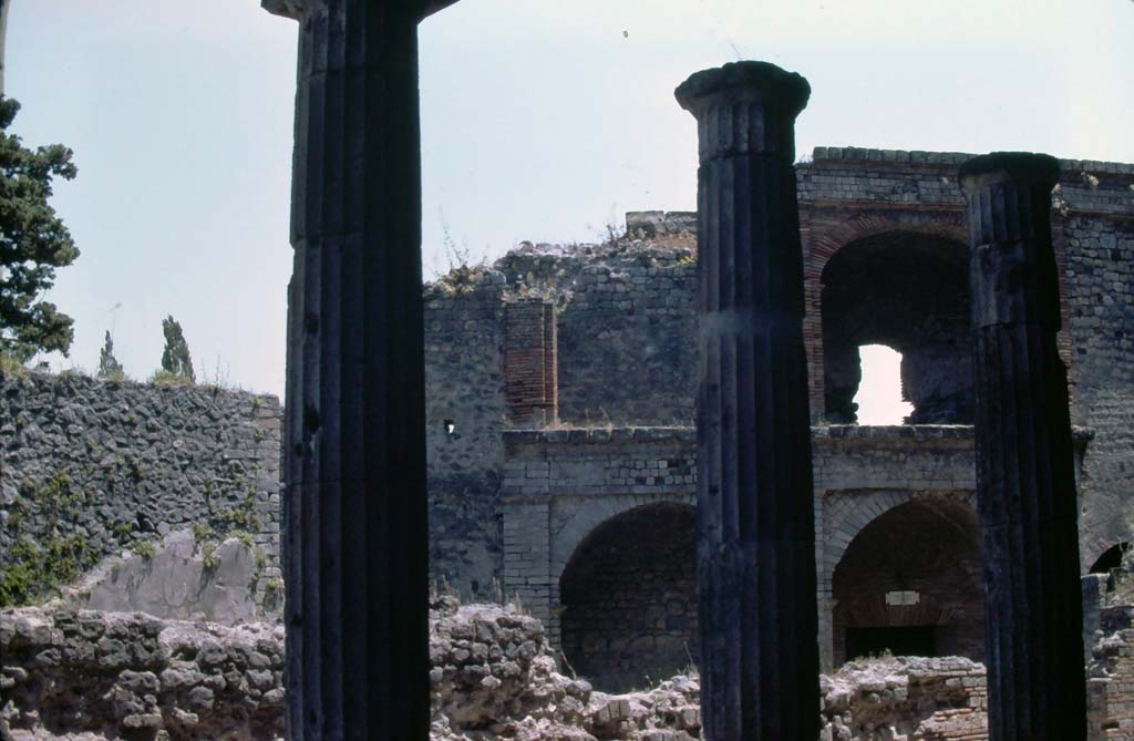VIII.7.21 Pompeii. July 1980. Looking east from Triangular Forum towards Large Theatre.
Photo courtesy of Rick Bauer, from Dr George Fay’s slides collection.
