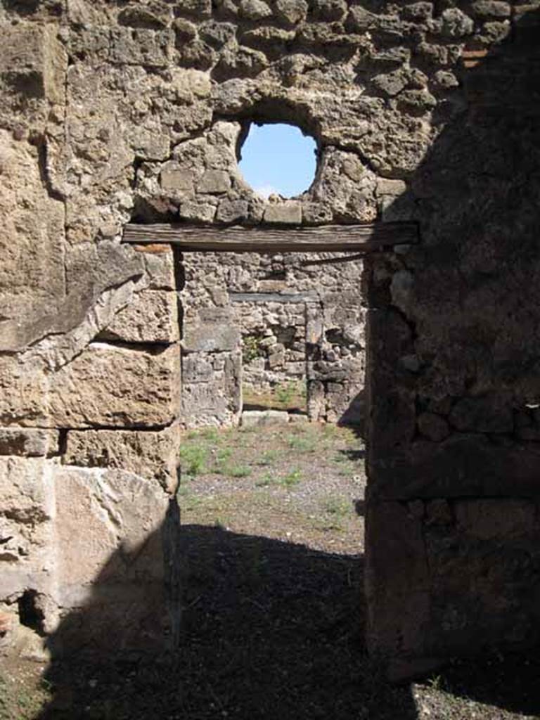 VIII.7.26 Pompeii. September 2010. Doorway from fourth room, looking east into the atrium. Photo courtesy of Drew Baker.
