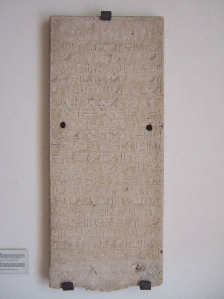 VIII.7.28 Pompeii.  Limestone stele with twenty lines of hieroglyphs.
These relate to the last twenty years of Pharoanic rule leading up to Egypt being conquered by Alexander the Great.  Found on a pillar placed at the entrance to the temple.  Now in Naples Archaeological Museum.
