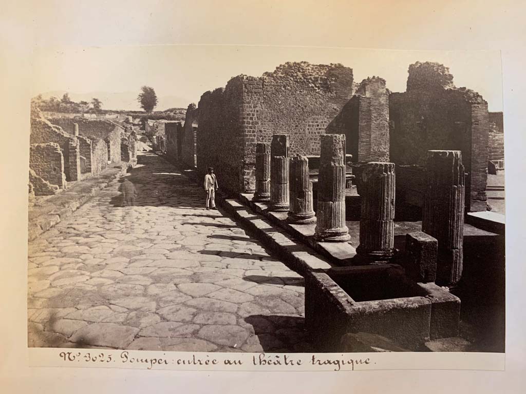 VIII.4, Pompeii, on left.  Via del Tempio d’Iside from entrance to Triangular Forum.    VIII.7.30, on right.  
From an album of Michele Amodio dated 1874, entitled “Pompei, destroyed on 23 November 79, discovered in 1745”. 
Looking east along Via del Tempio d’Iside. Photo courtesy of Rick Bauer.


