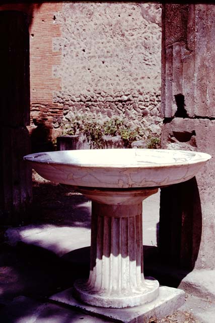 VIII.7.30 Pompeii, 1978. Looking north-west towards fountain. Photo by Stanley A. Jashemski.   
Source: The Wilhelmina and Stanley A. Jashemski archive in the University of Maryland Library, Special Collections (See collection page) and made available under the Creative Commons Attribution-Non Commercial License v.4. See Licence and use details. J78f0568
