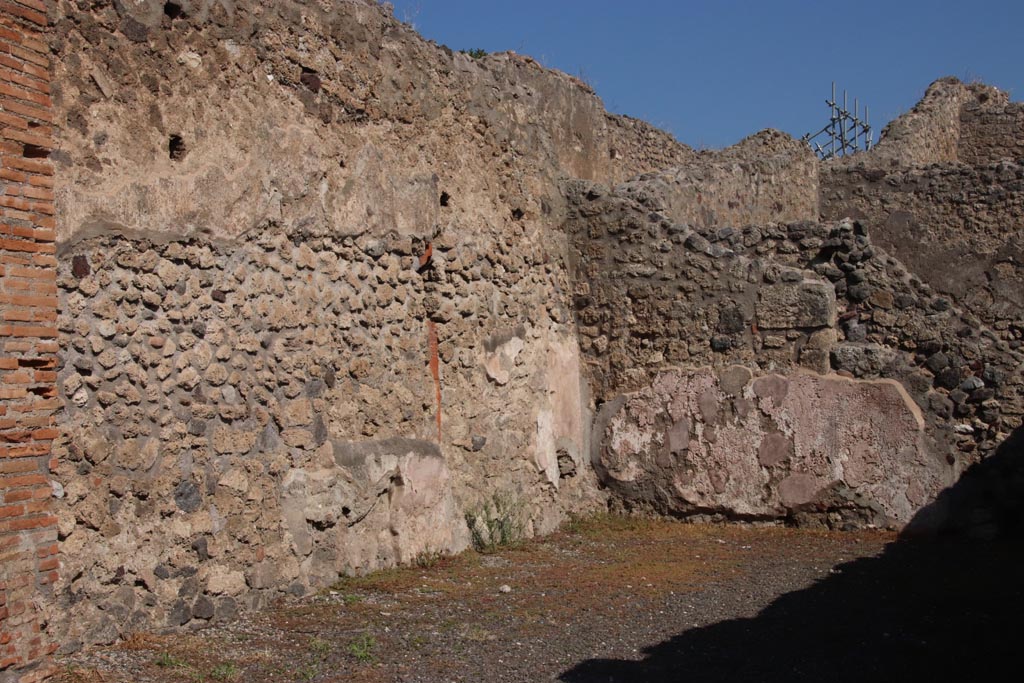 IX.1.1 Pompeii. October 2022. North wall and north-east corner of shop-room. Photo courtesy of Klaus Heese.