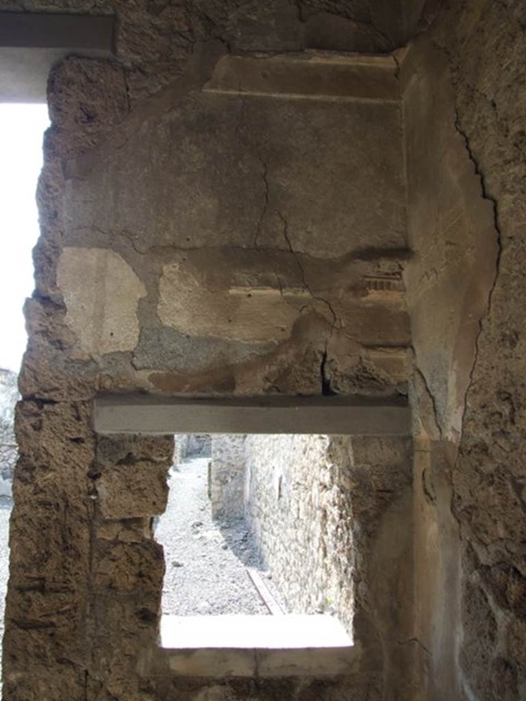 IX.2.17 Pompeii.  March 2009.  Room 2, Cubiculum.  West wall with window to Room 1, Atrium.