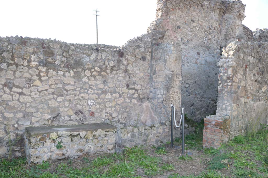 IX.3.17 Pompeii. December 2018. 
Looking towards west side of workshop, bench with water basin, and doorway to corridor to rear. Photo courtesy of Aude Durand.
