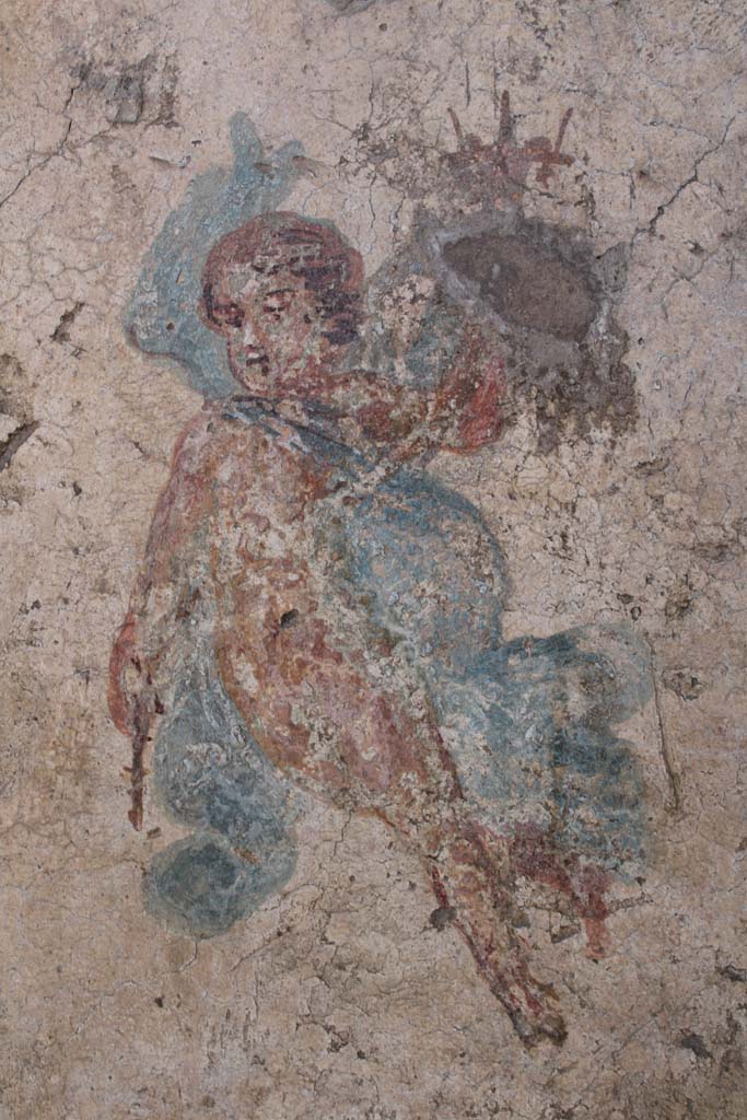 IX.5.16 Pompeii. May 2019. Room f’, detail of flying cupid with cornucopia.
Foto Christian Beck, ERC Grant 681269 DÉCOR.
