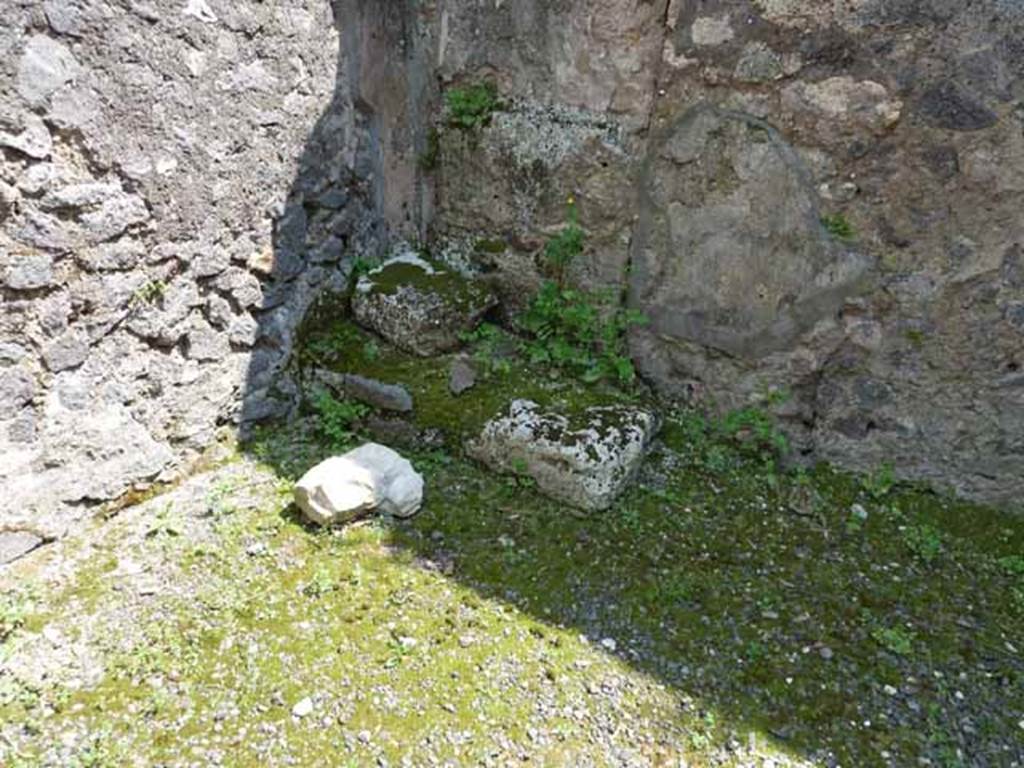 IX.8.2 Pompeii. May 2010. Base of stairs to upper floor in south-east corner of rear room.