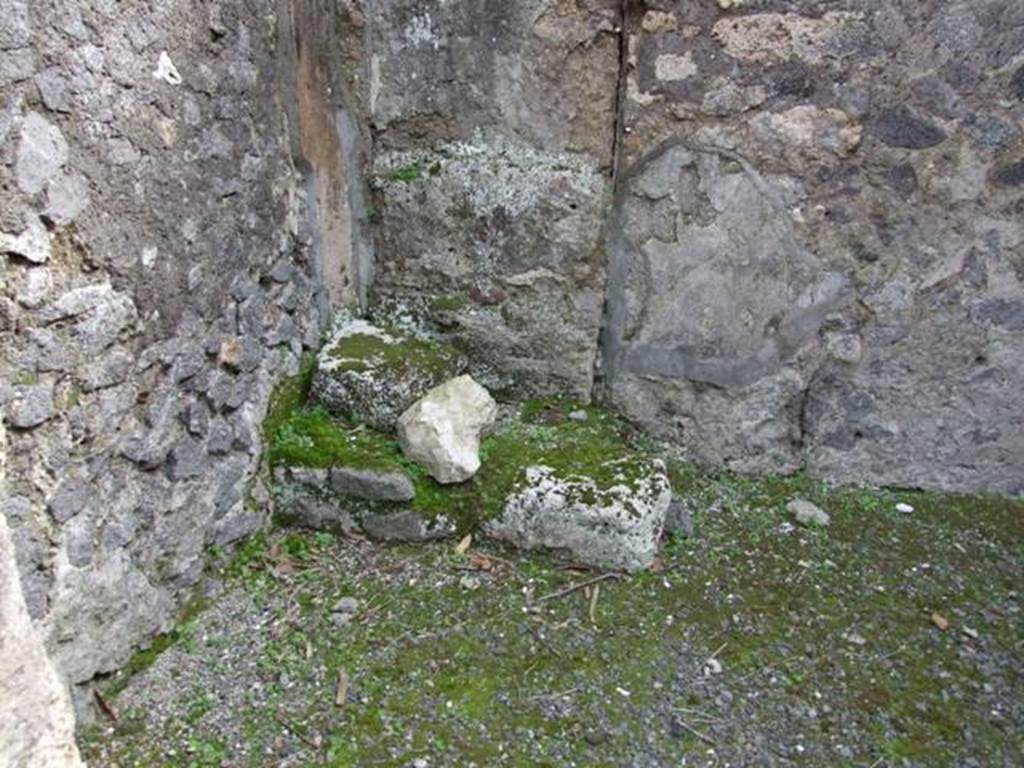 IX.8.2 Pompeii.  March 2009.  South east corner of rear room, with stone base for stairs to wooden pergula. The latrine was under the stairs.