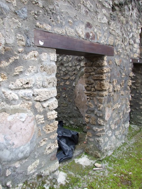 IX.8.6 Pompeii. March 2009.  West Portico. South door in west wall leading to Room 22.