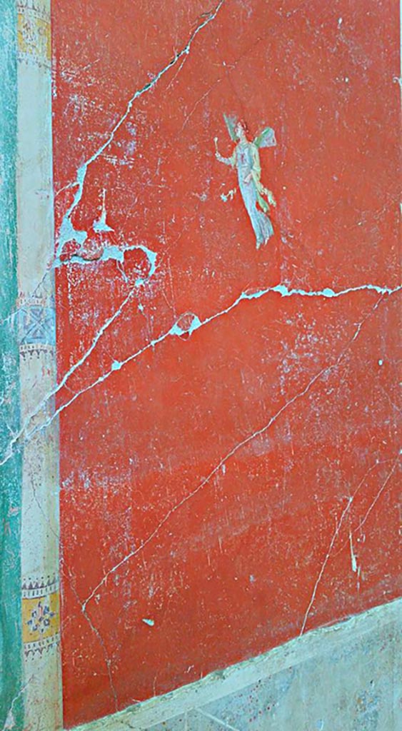 IX.12.6 Pompeii. 2016/2017.
Room 3, flying figure from north side of central painting on west wall.
Photo courtesy of Giuseppe Ciaramella.

