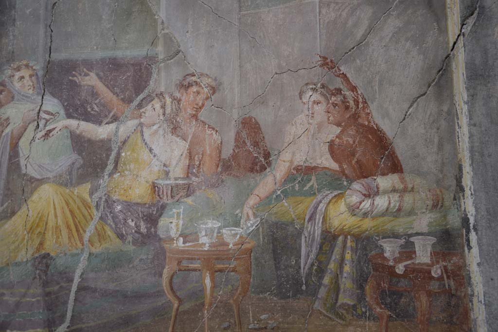 IX.12.6 Pompeii. February 2017. 
Room 3, detail of figures in banqueting scene from west wall of triclinium. Photo courtesy of Johannes Eber.
