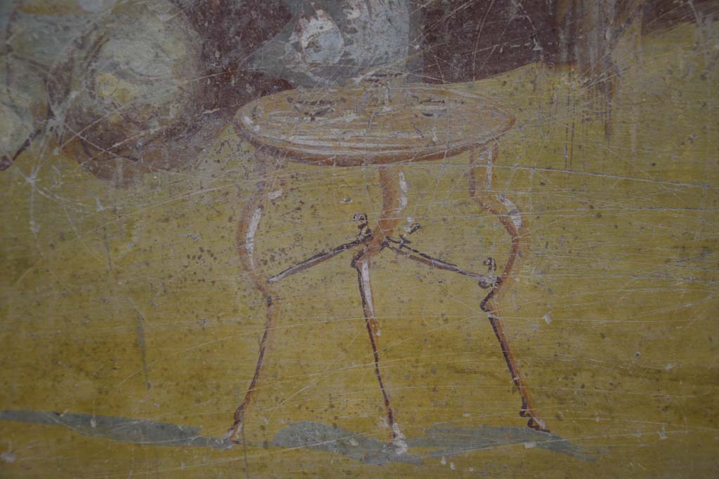 IX.12.6 Pompeii. February 2017. Room 3, detail of table in banqueting scene on east wall of triclinium. Photo courtesy of Johannes Eber.
