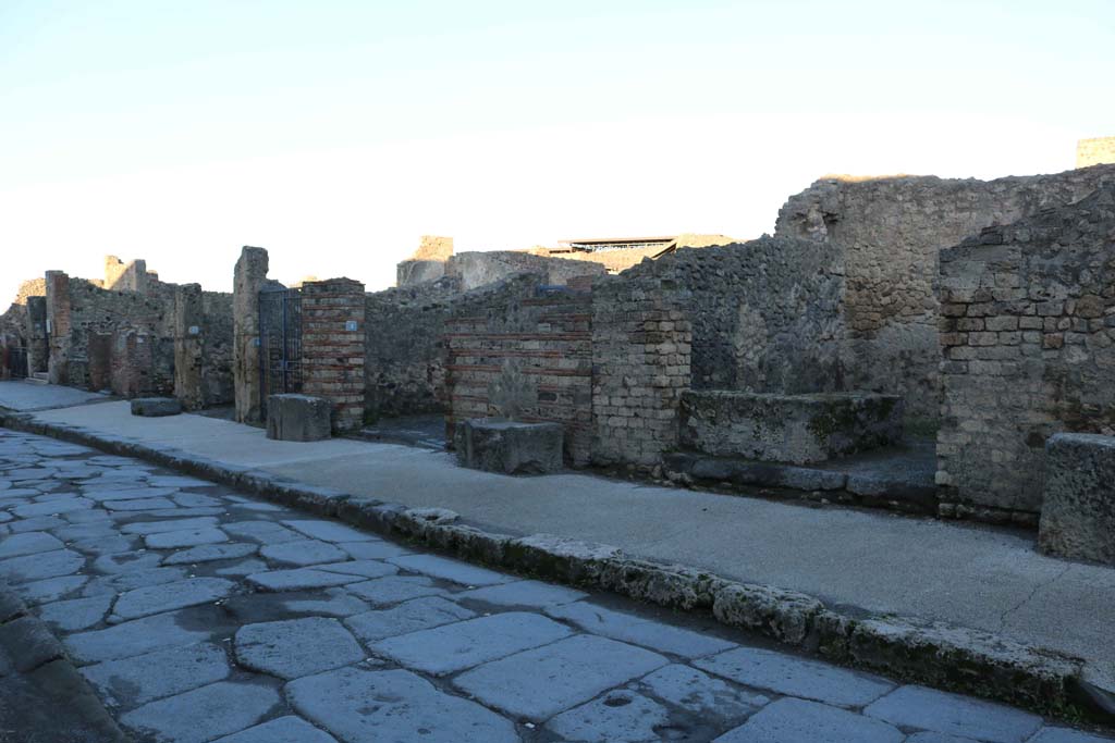 Via Marina, north side, Pompeii. December 2018. 
Looking north-west towards VII.7.10, on left, and VII.7.3, on right. Photo courtesy of Aude Durand.
