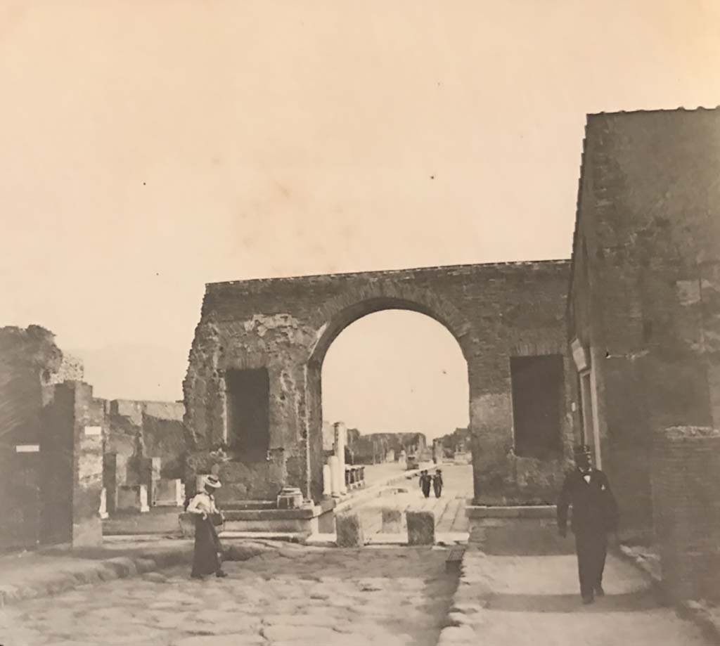 Via del Foro, Pompeii. Undated photo (c.1900-1920). Looking south through Arch of Caligula towards Forum. 
On the right is the area now occupied by the Restaurant.  Photo courtesy of Rick Bauer.
