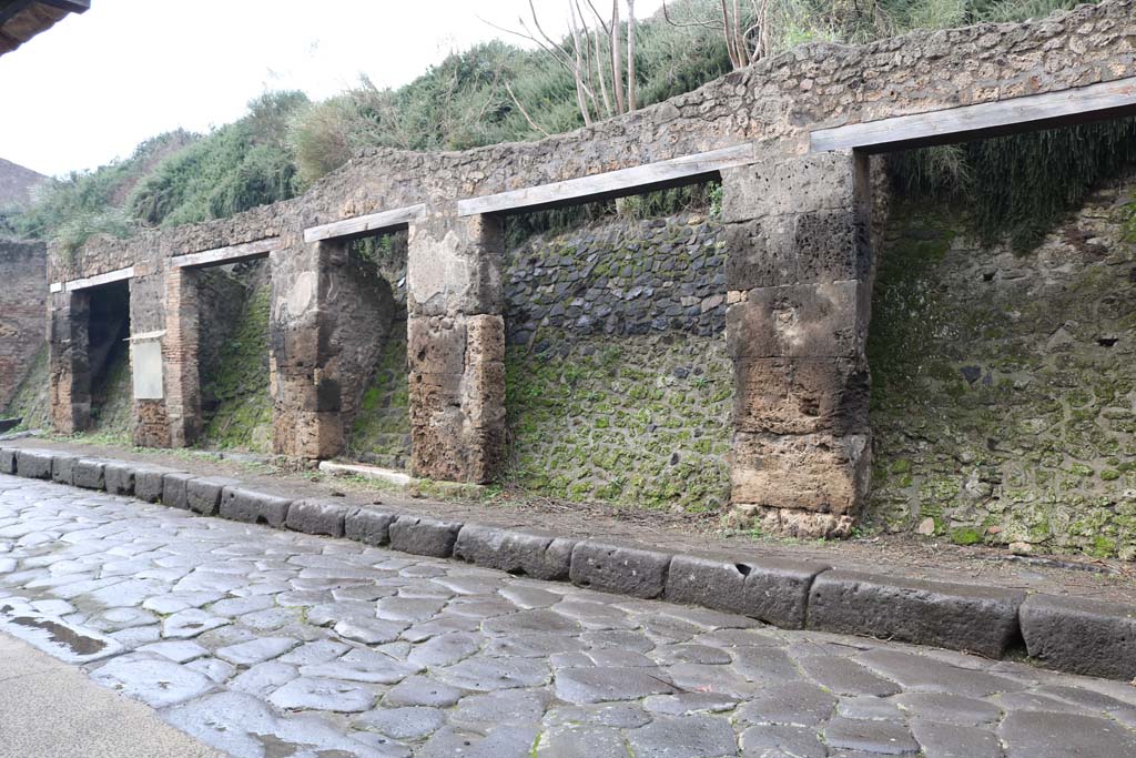 Via dell’Abbondanza, north side. Pompeii. December 2018. 
Looking west from III.1.5, on right, towards III.1.1, on left. Photo courtesy of Aude Durand.
