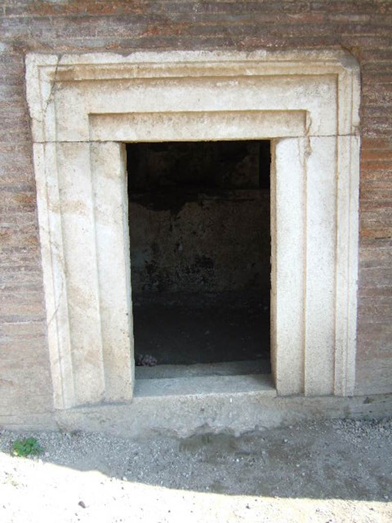 Pompeii Porta Nocera. Tomb 17ES. Marble door surround. May 2006.