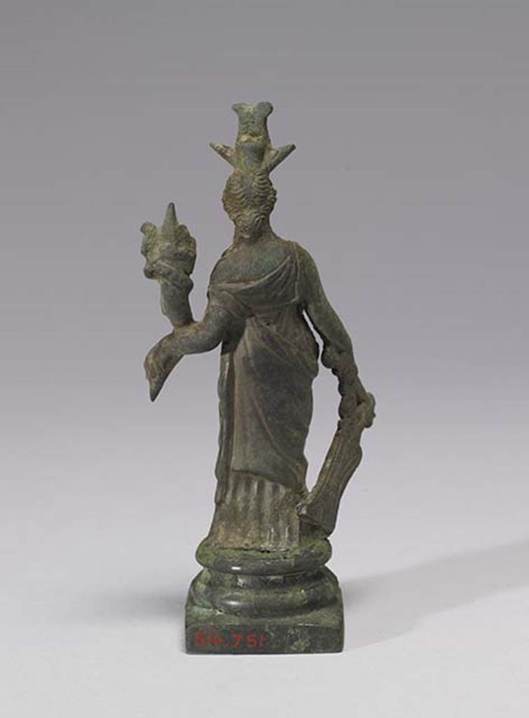 Boscoreale, Villa rustica in fondo D’Acunzo. Room 12, lararium. 
Larger bronze statuette of Isis-Fortuna, rear view.
Photo courtesy of The Walters Art Museum, Baltimore. Inventory number 54.751.
http://thewalters.org/
Creative Commons Attribution-ShareAlike 3.0 Unported Licence
