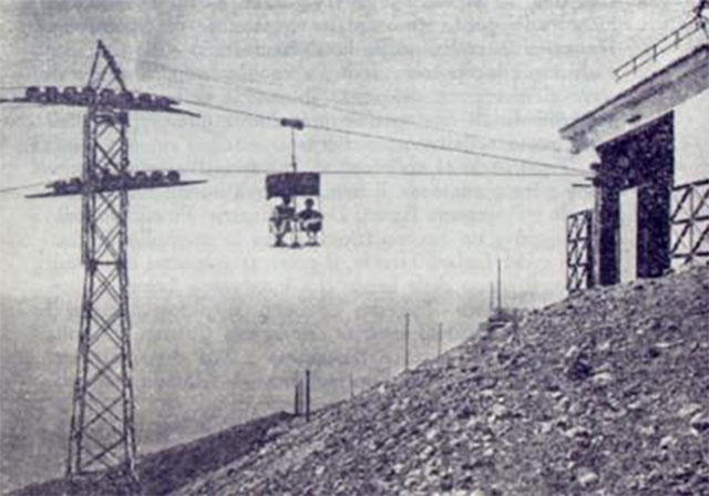 Vesuvius light railway. Bus and shuttle train interchange at Eremo-Observatory.
By 1953 the improved road was complete as far as the Hotel Eremo-Observatory and the excursion coaches from Naples and regular bus from Pugliano could bring people to this point, where they changed to a shuttle train for the last 2,1 km until the chair lift. A rack locomotive pushed two cars, usually 6 and 7 up from the depot each morning and stayed at Eremo all day until the convoy returned home at night. 