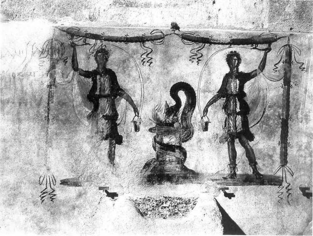 Pompeii, street altar on west side wall of I.11.1. Old undated photo.
See Ragghianti, C.L., 1963. Pittori di Pompei. Milano: Edizioni del Milione. Tav. 86.
The picture is painted over a masonry altar on the white-ground pedestal that continues along the entire facade. 
Two large Lares flank a round altar, around which a serpent winds, which lowers its head over the offerings lying in the fire. 
At the top there are two red, yellow and green garlands, one on each side. 
On the left of the picture the graffito Lariis sanctos rogo t (e) ut is carved in red stone. Underneath is painted the election call Ceium aed.
See Fröhlich, T., 1991. Lararien und Fassadenbilder in den Vesuvstädten. Mainz: von Zabern. (F7, Taf 53,1).
The Epigraphik-Datenbank Clauss/Slaby (See www.manfredclauss.de) records

[Per] Lares Sanctos
rogo te ut [   [CIL IV 8426, AE 1914, 149]
