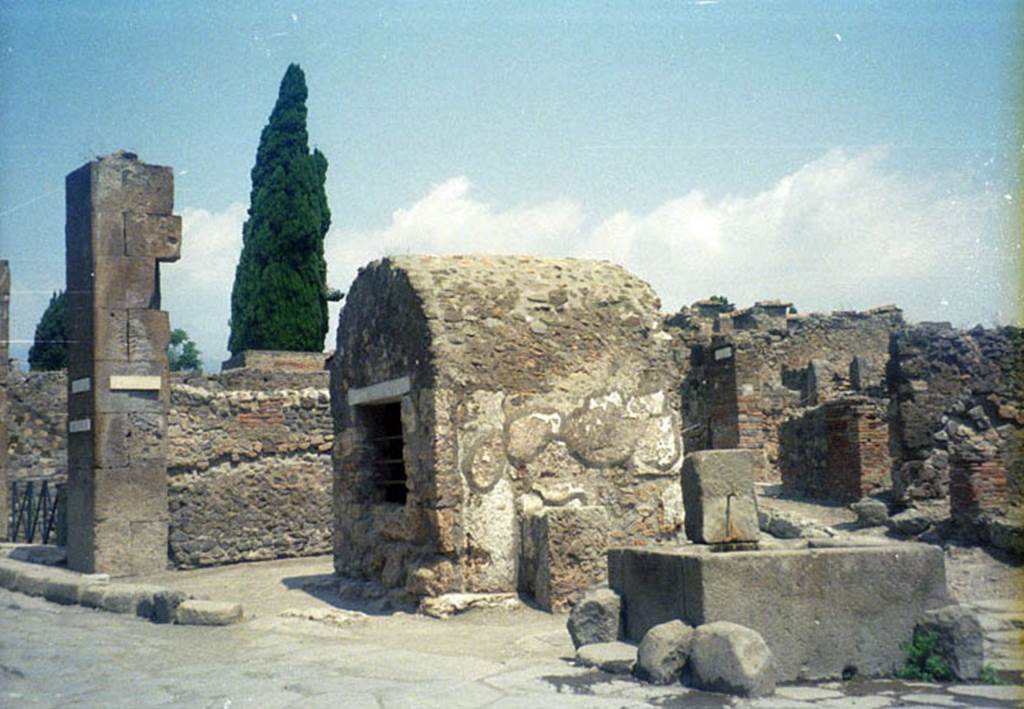 Pompeii. Street altar at VI.1.19, on south side of deep well. July 2011. Photo courtesy of Rick Bauer.