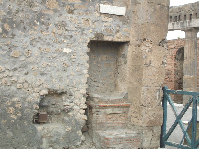 Outside VIII.2.11 Pompeii. December 2018.  
Street altar at corner of Via delle Scuole. Photo courtesy of Aude Durand.
