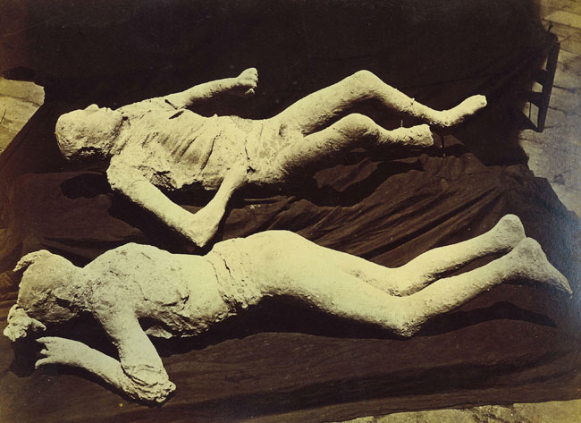 Victim 10 in VII.1.8 Pompeii. April 2019. Looking towards west wall of destrictarium E at west end of south portico B. 
The plaster-cast of the young female found at the north-east corner of VI.14 is displayed here.  Photo courtesy of Rick Bauer.
