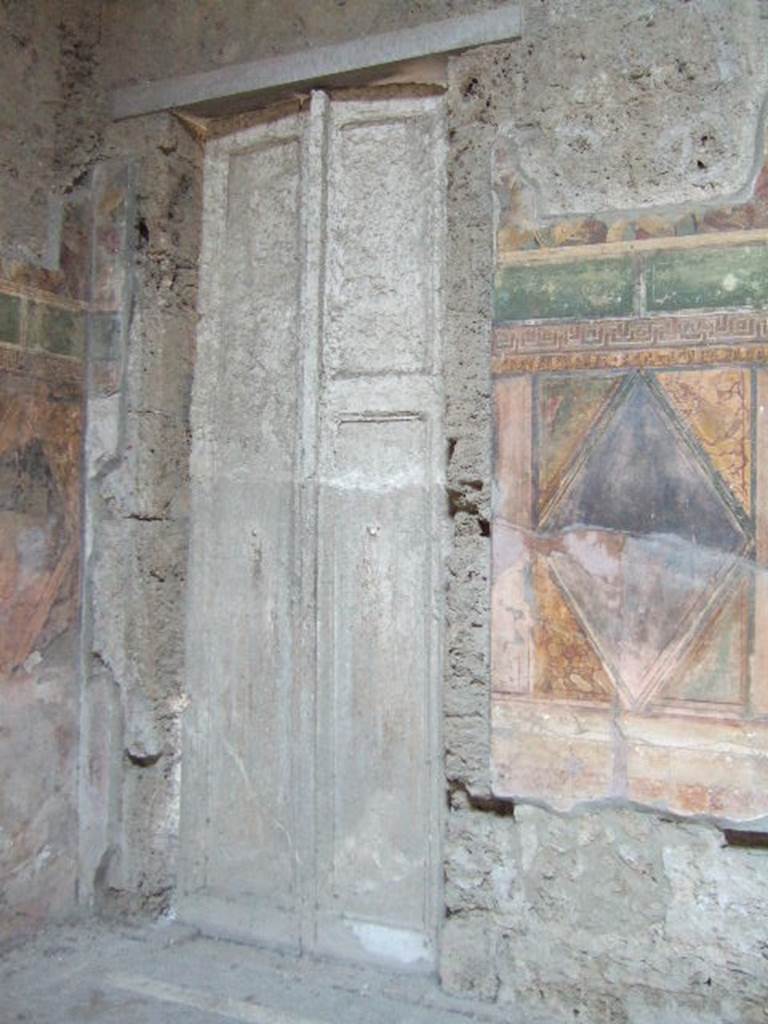 Villa of Mysteries, Pompeii. May 2006. Room 64, cast of doors in north-east corner.