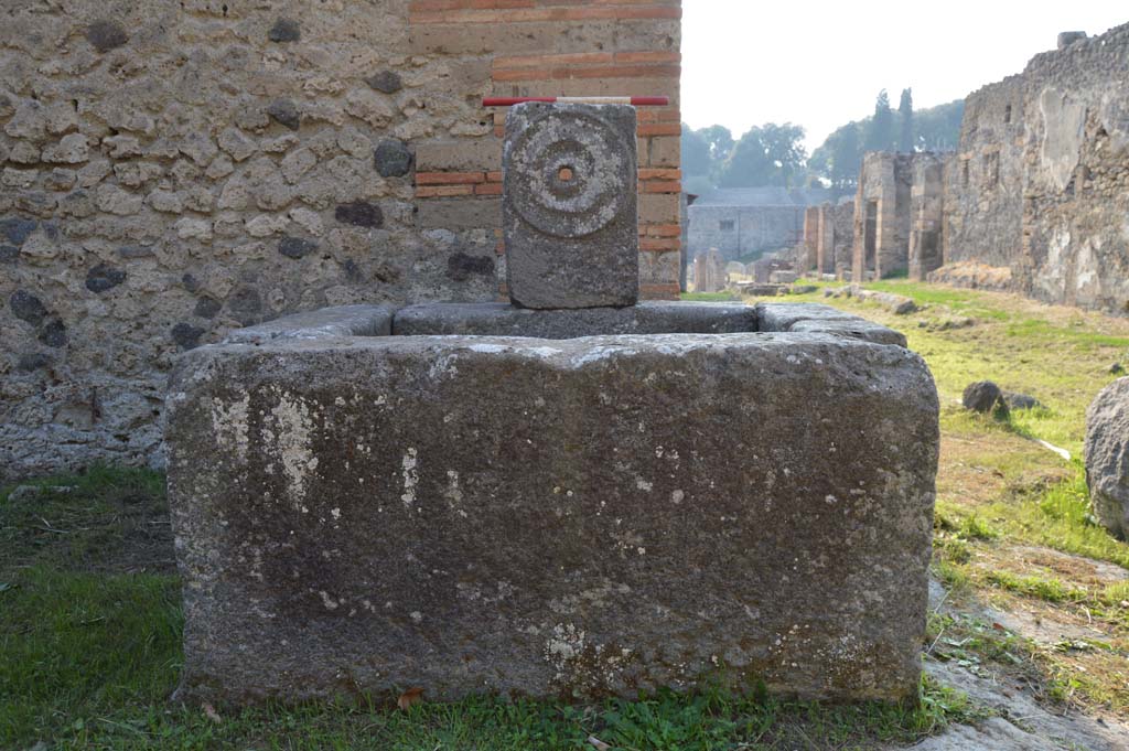 Fountain at corner of I.5.2, Pompeii.  Looking west along Vicolo del Conciapelle, toward Via Stabiana. Photo courtesy of Drew Baker. September 2010.


