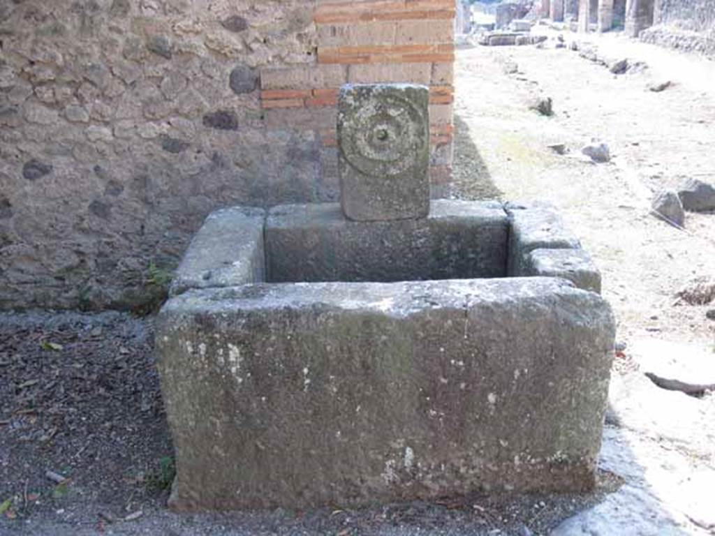 Fountain outside I.5.2, Pompeii. September 2005. Relief of “patera” or plate.