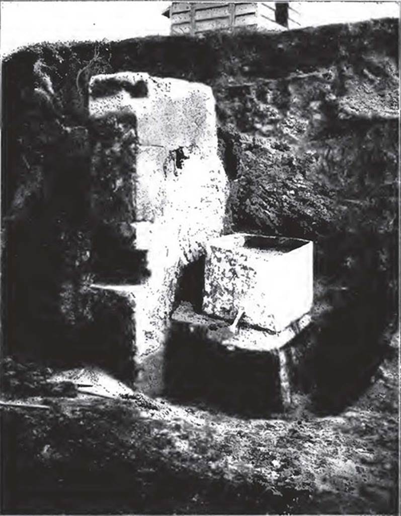Water column on north-west corner of II.2 on Vicolo di Octavius Quarto. 1916-17.
The top of the water column is shown during excavation. 
On it was found a lead tank which had two pipes, one presumably bringing water in and one to take it out. 
See Notizie degli scavi di antichità: Vol 14, 1917. Roma: Real Accademia dei Lincei. (p. 255).

