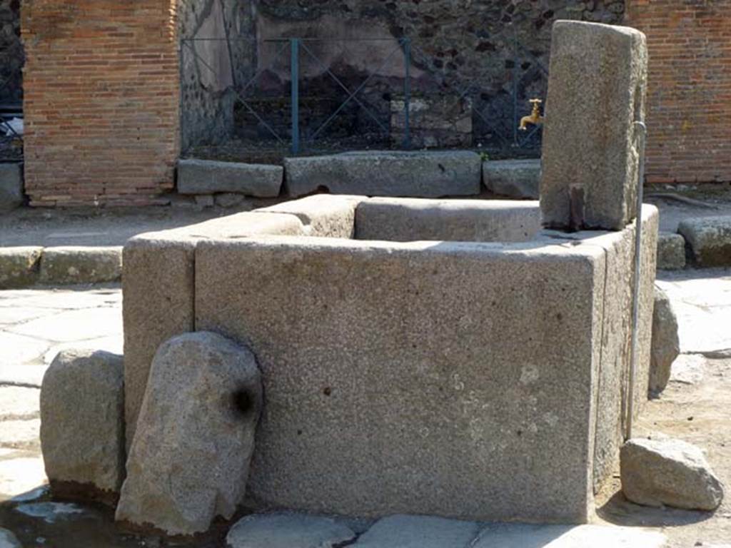 Pompeii. Fountain at VI.1.19, with modern drinking tap. May 2011. Looking west towards VI.17.19. Photo courtesy of Michael Binns.
