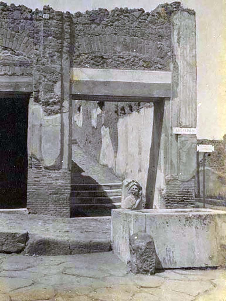 VII.9.67 Pompeii. Photograph by M. Amodio, from an album dated April 1878.
Looking north on Via dell’Abbondanza towards fountain. Photo courtesy of Rick Bauer.
