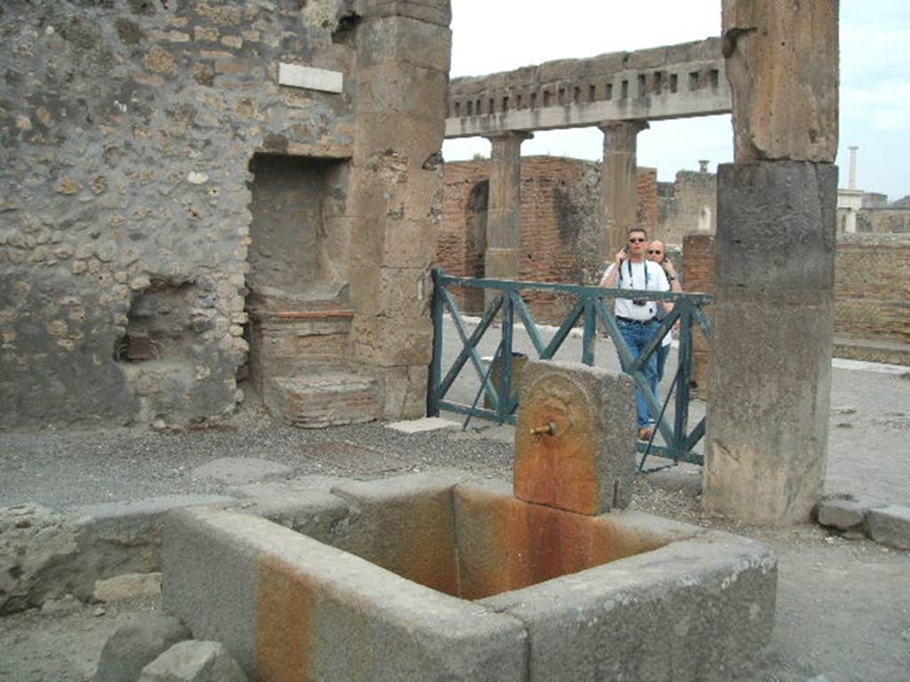 Outside VIII.2.11, Pompeii. 
From an album of Michele Amodio dated 1874, entitled “Pompei, destroyed on 23 November 79, discovered in 1745”. 
Looking north towards Forum from fountain at end of Via delle Scuole. Photo courtesy of Rick Bauer.

