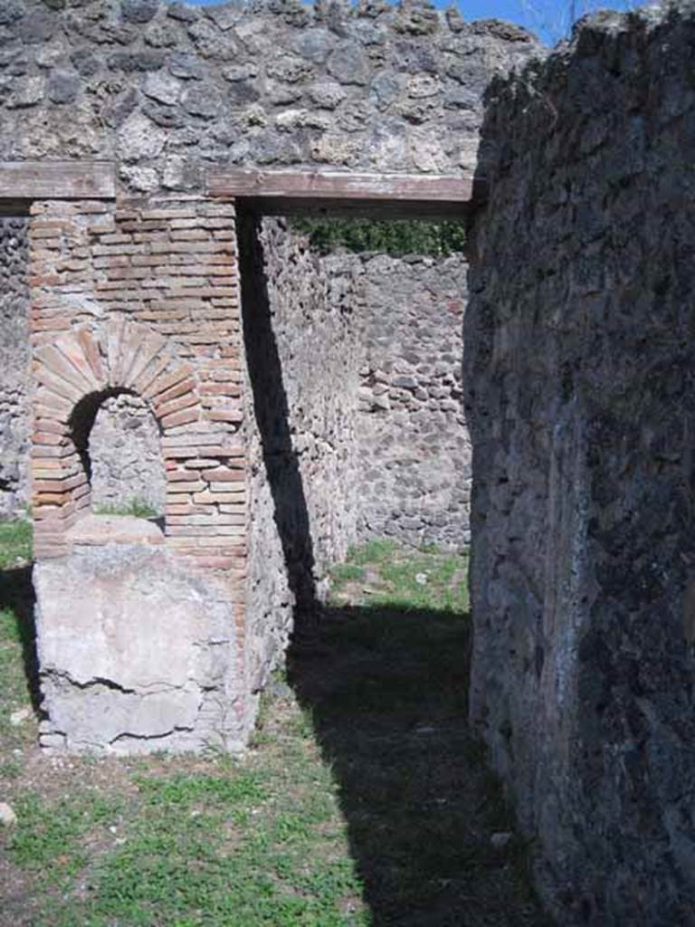 I.1.2 Pompeii. September 2010. Doorway to large room on south side of customers’ room. Photo courtesy of Drew Baker. According to Fiorelli this contained the hearth, the latrine and a staircase to the upper floor.


