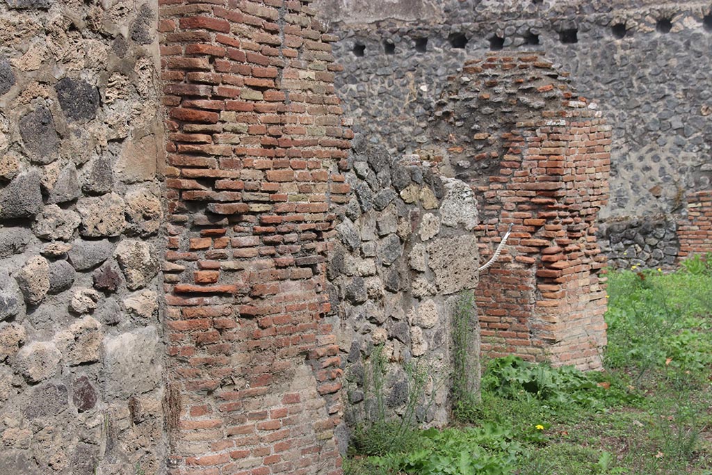 I.1.3 Pompeii, October 2024. North wall of room “b”, with doorway leading into I.1.4. Photo courtesy of Klaus Heese.