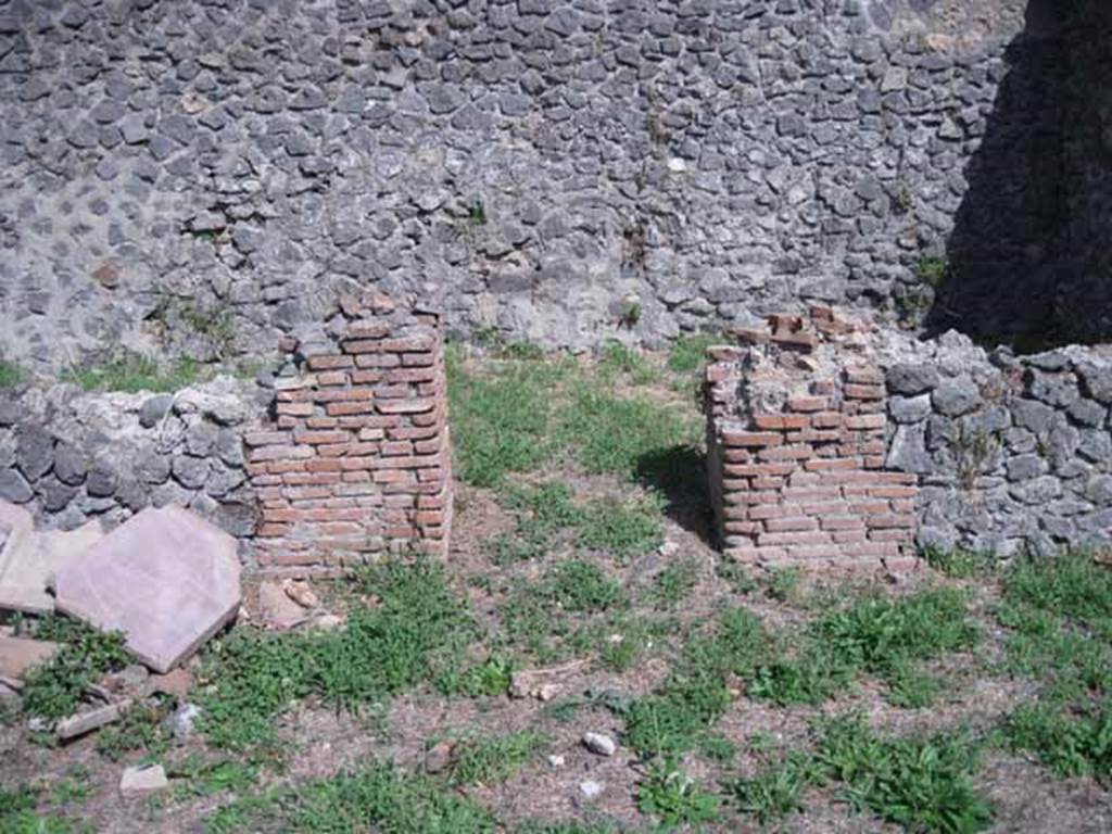 I.1.3 Pompeii. September 2010. Doorway to stables at rear of yard area, looking west. Photo courtesy of Drew Baker.
