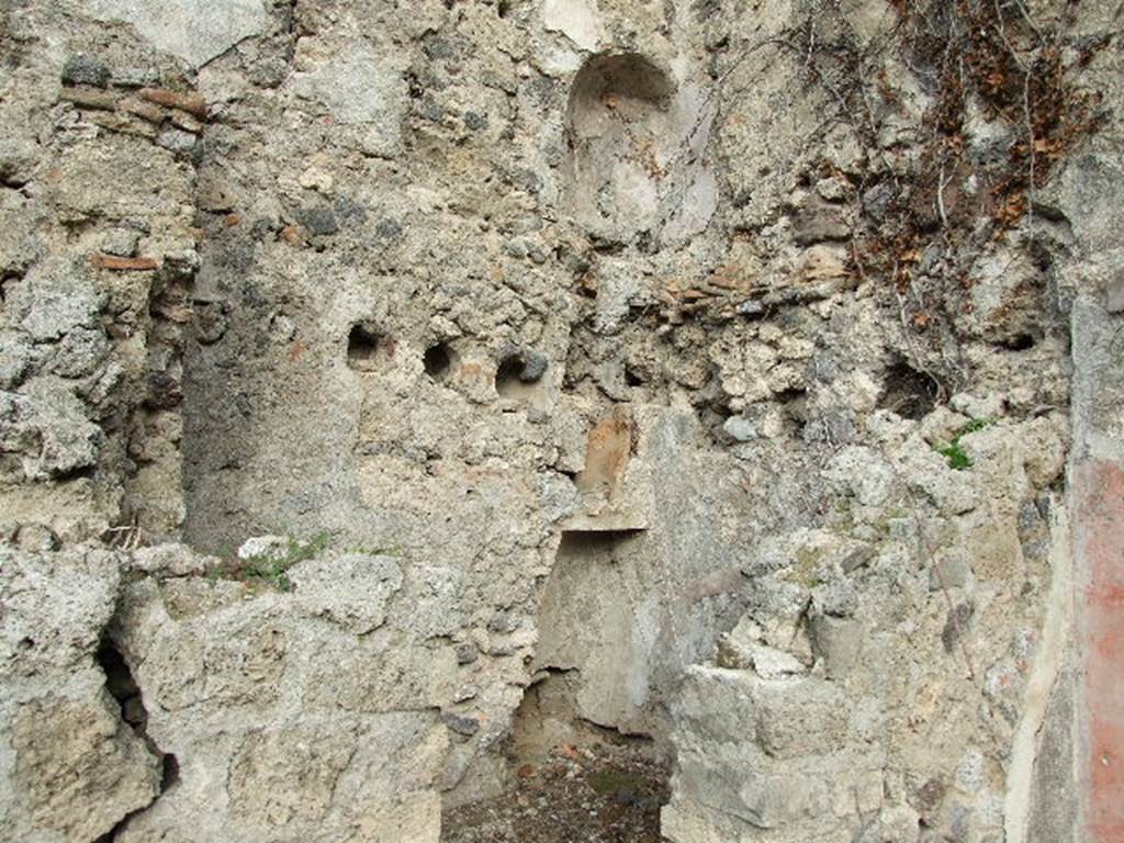 I.2.6 Pompeii. December 2006. Latrine on ground floor, with another on the first floor visible above the downpipe.