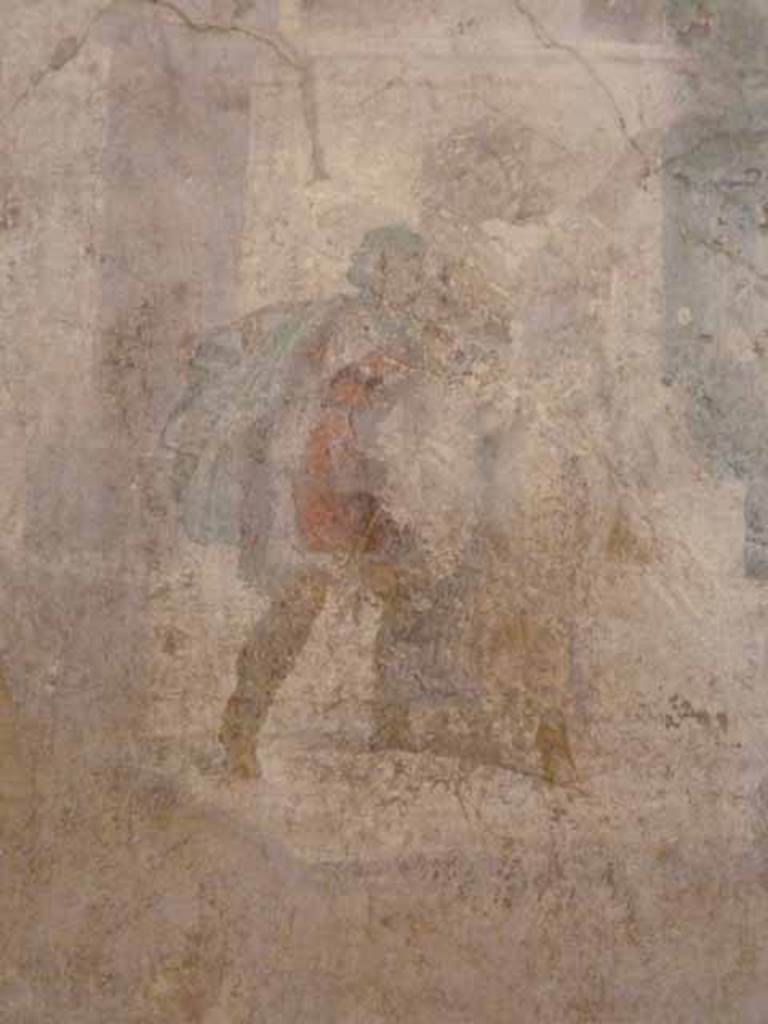 I.2.6 Pompeii.  May 2010. Detail from the wall painting of the Theft of the Palladium (Ratto del Palladio) found on the south wall of the triclinium. On the right of the painting another of the Greeks forcibly removes the priestess who is opposing the theft.Now in Naples Archaeology Museum, inventory number: 109751.
