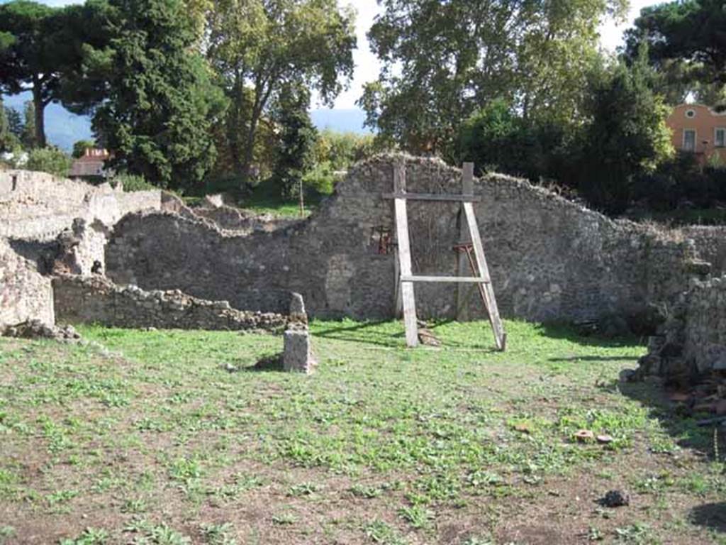 1.2.6 Pompeii. September 2010. Looking south across atrium, towards remains of south perimeter wall, and house I.2.3.  Photo courtesy of Drew Baker
