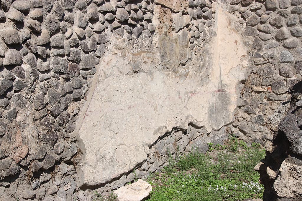 I.2.7 Pompeii. October 2024. 
North wall of rear room in north-east corner, with outline of site of stairs in plaster, on left. Photo courtesy of Klaus Heese.
