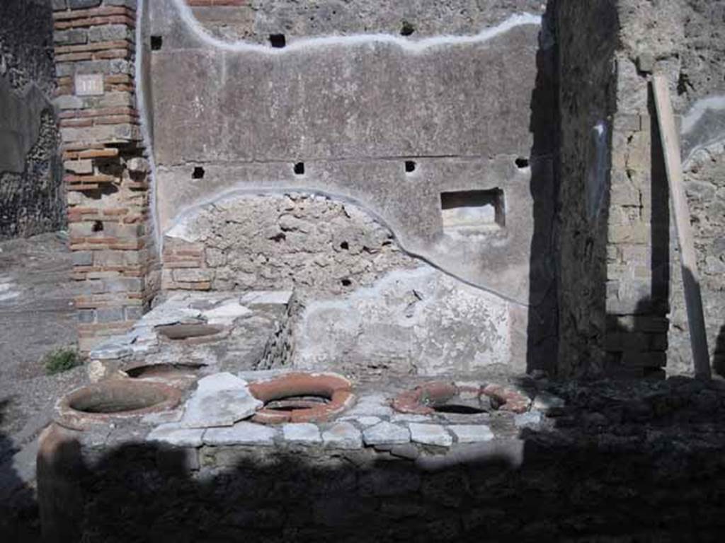 I.2.18 Pompeii. September 2010. East wall of bar. Photo courtesy of Drew Baker.